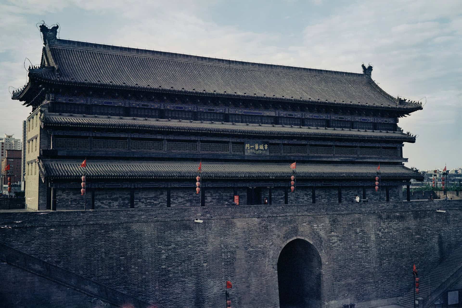 A gate tower on Xi'an's city wall strung with red lanterns