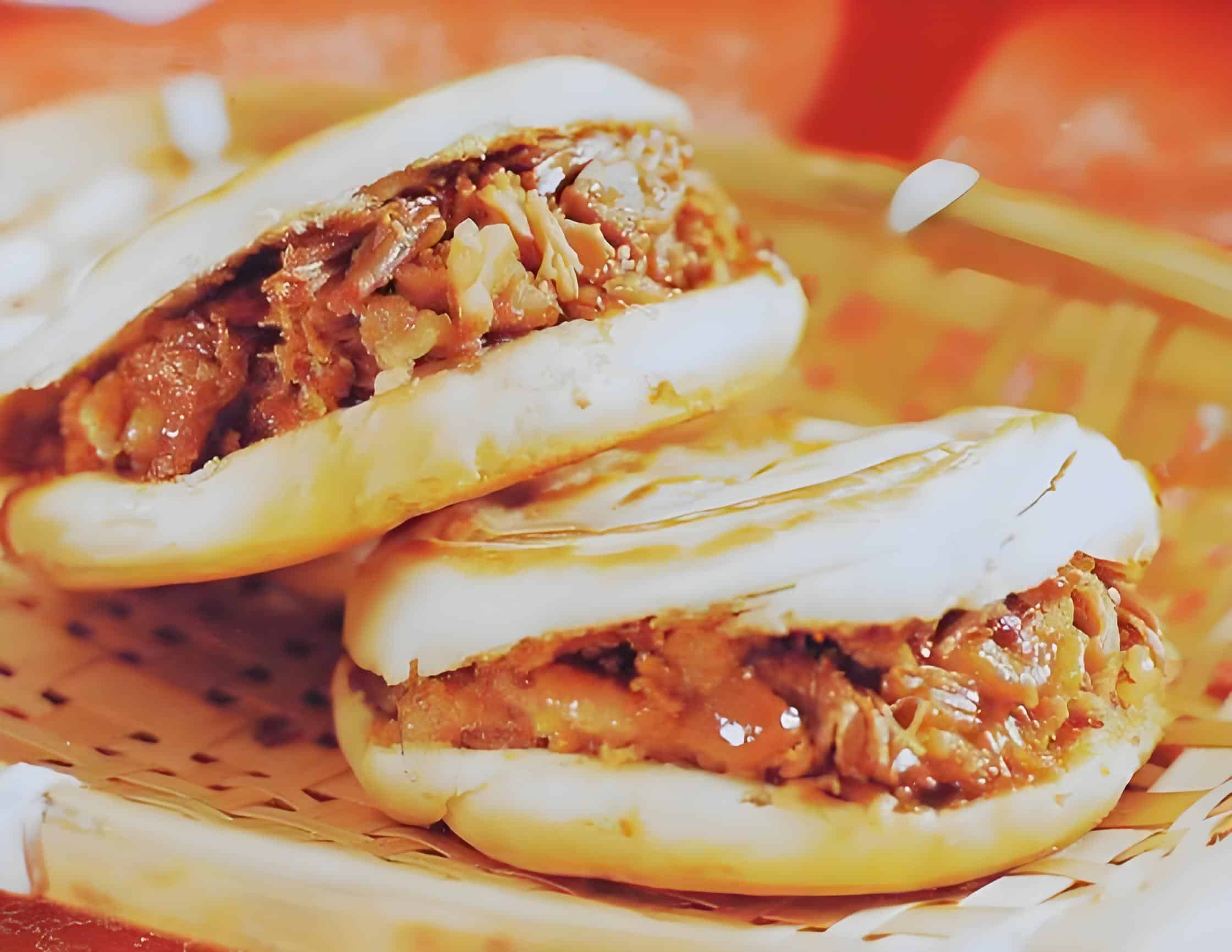 Roujiamo: chopped spiced pork in a crisp baked bun