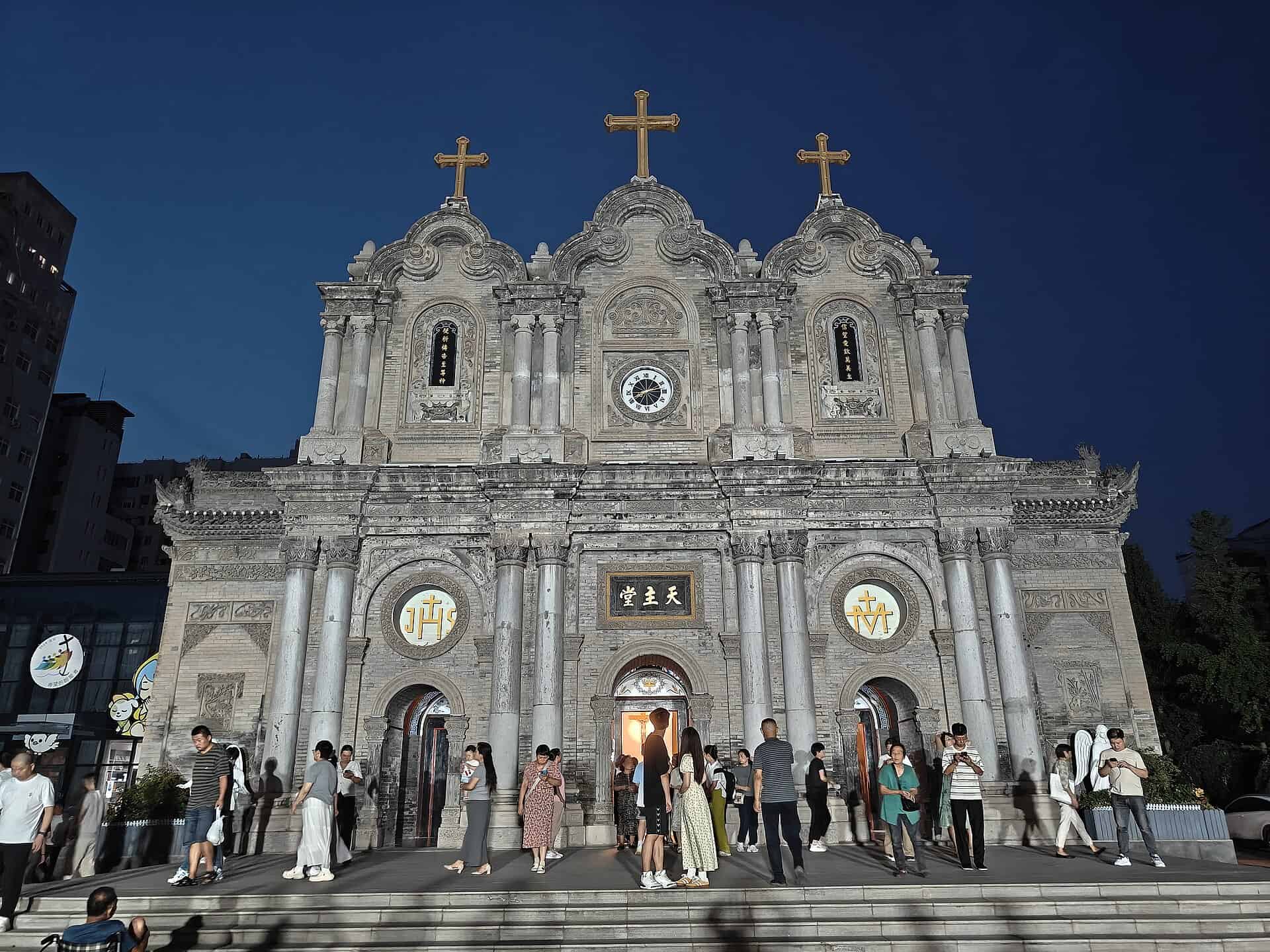 Stone facade of St. Francis Cathedral (Wuxing Street Catholic Church) in Xi'an at night