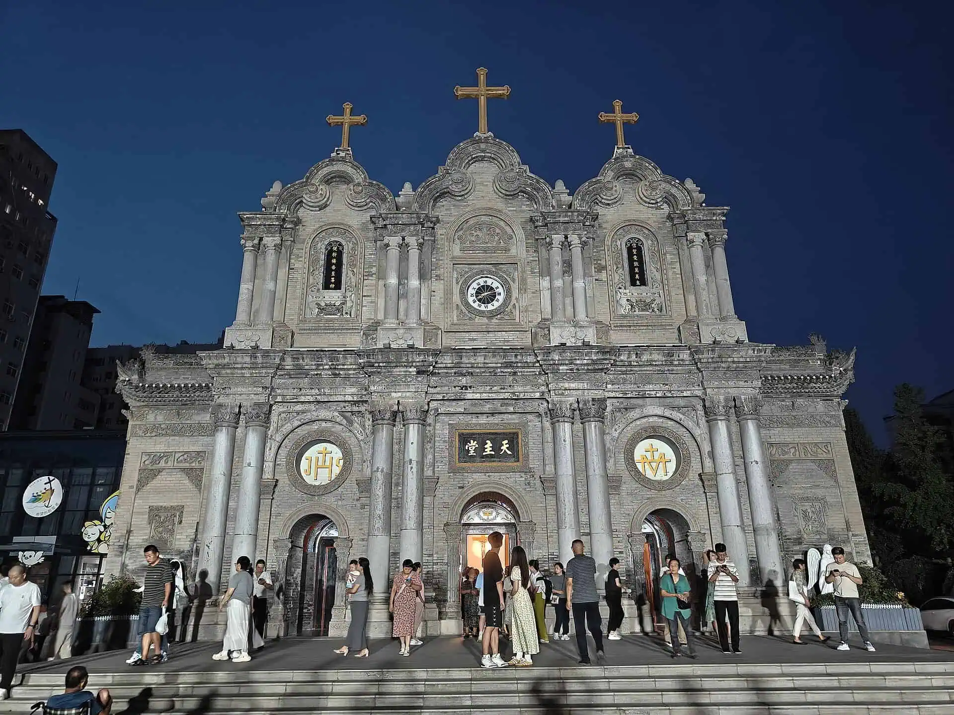 Stone facade of St. Francis Cathedral (Wuxing Street Catholic Church) in Xi'an at night