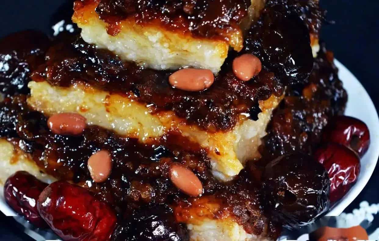 Steam rising off zenggao, sticky-rice jujube cake